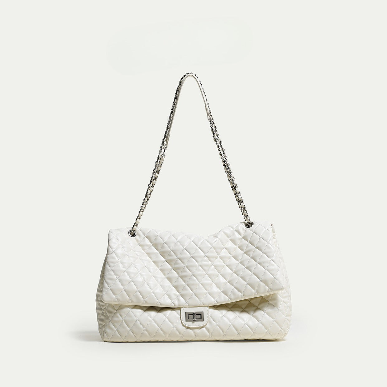 "First Class Arrival" Black Quilted Chain Tote Bag