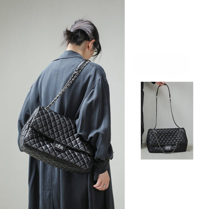 "First Class Arrival" Black Quilted Chain Tote Bag