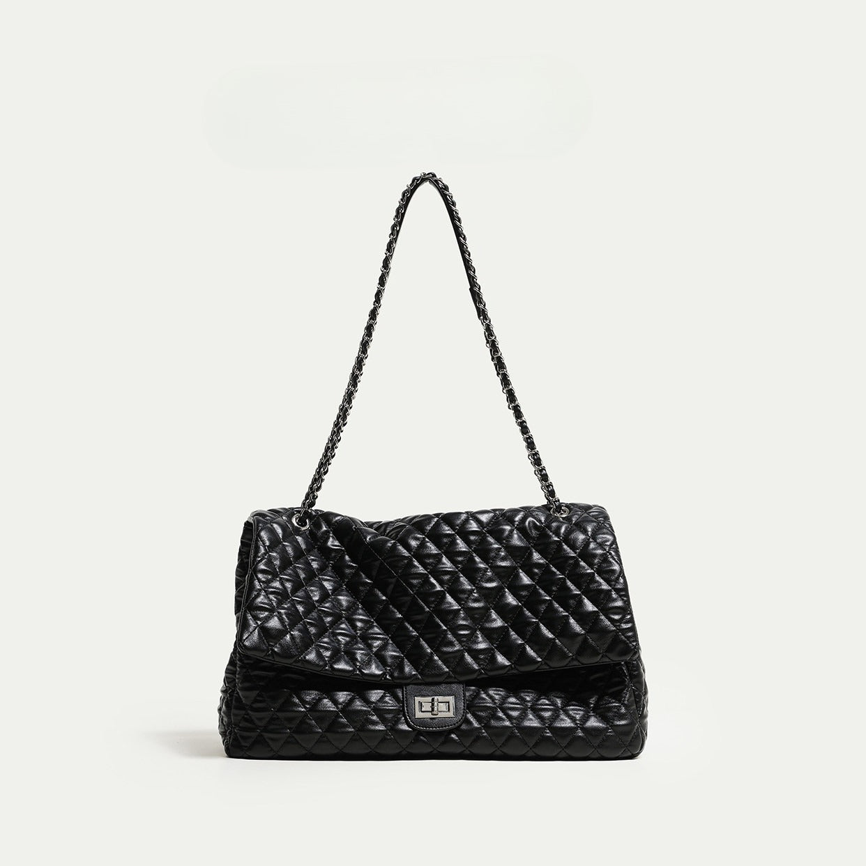 "First Class Arrival" Black Quilted Chain Tote Bag