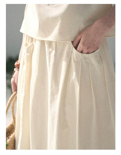 “Ivory Pleated Verse” Soft White Asymmetrical Twist Top & Skirt