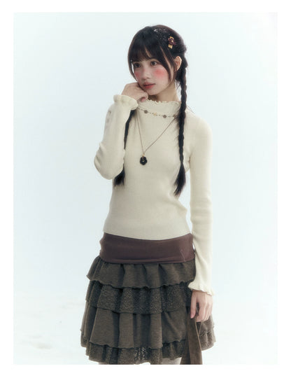 Horridale - Vintage Ruffle-Trim Wool-Blend Mock Neck Top (White Almond / Dark Gray)