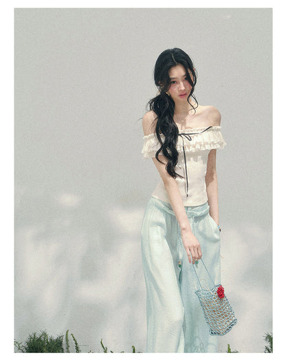 “White Pearlight” Ivory Off-Shoulder Ruffle Tee