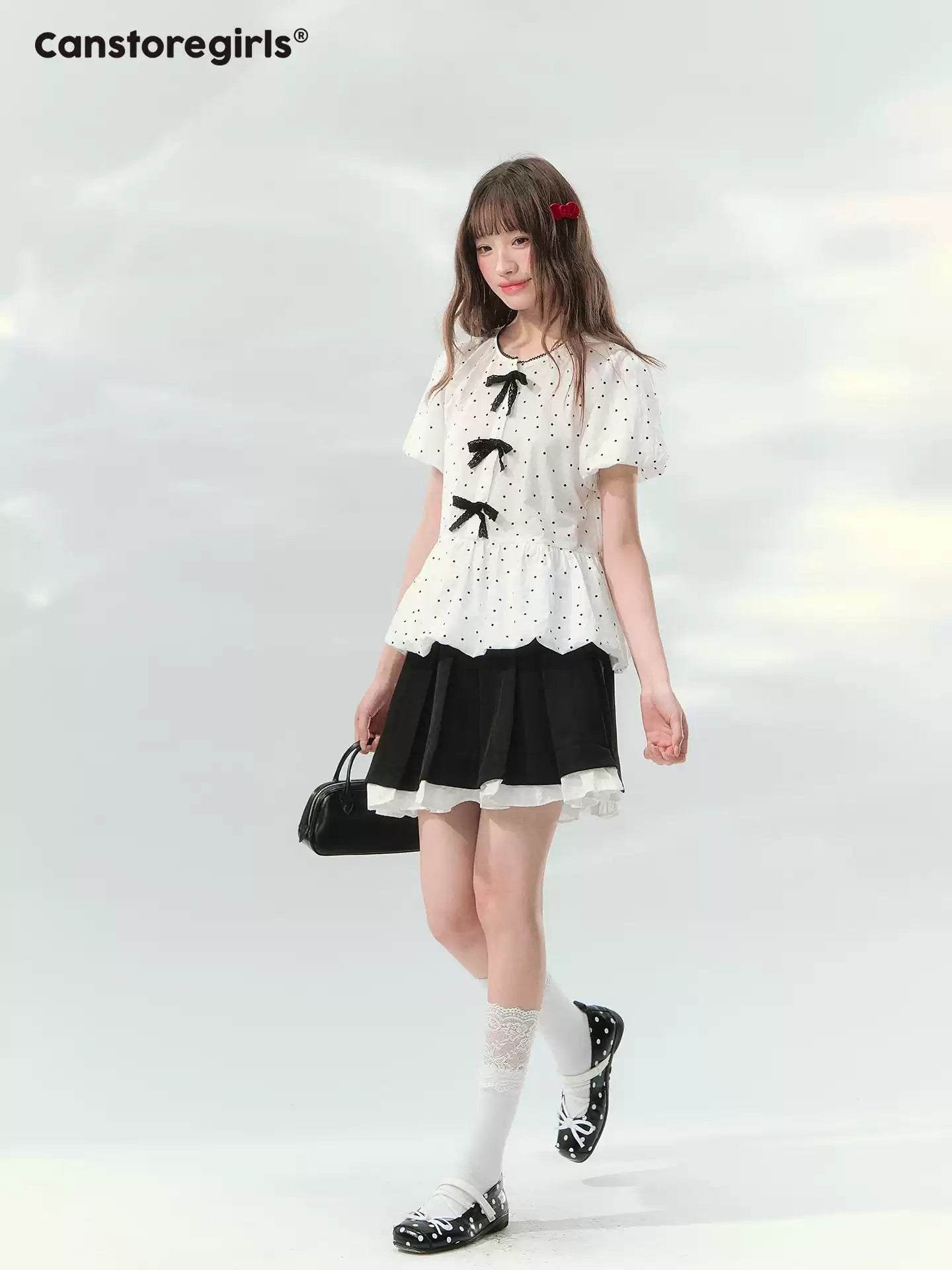 “Polka Soufflé” White Polka Dot Bow Peplum Blouse