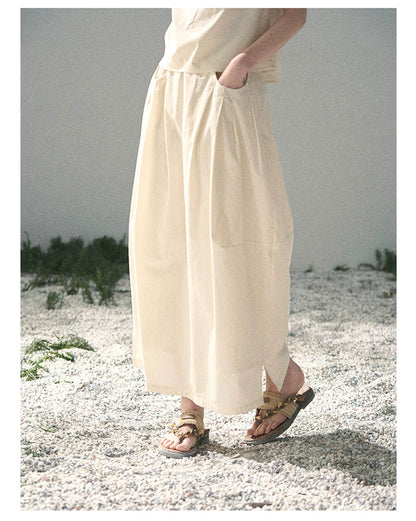 “Ivory Pleated Verse” Soft White Asymmetrical Twist Top & Skirt