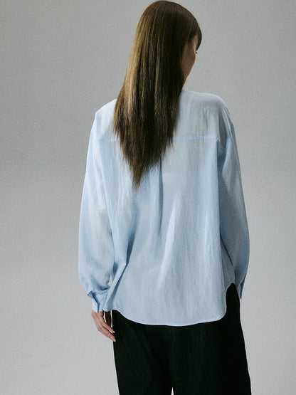 LOST FOREST - Water Blue Asymmetrical Lyocell Tie-Strap Blouse with Ruffle Trim
