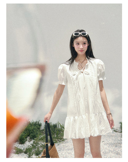 “Soft Pleats in Motion” Camellia White Bubble Mini Dress