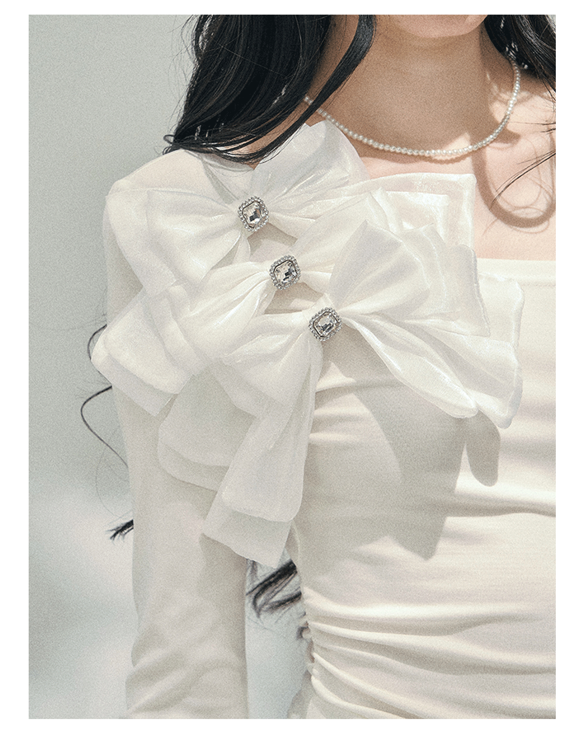 少也眼 "Morning Mist Shoulder" Bow Off-Shoulder T-Shirt in Cloud White 52742574