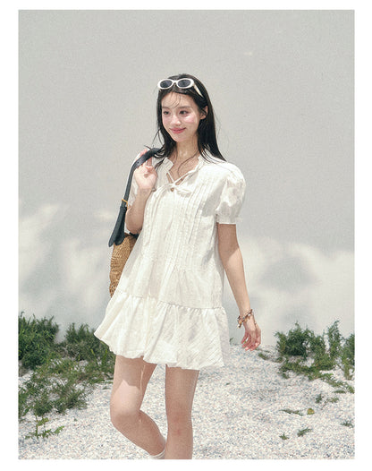 “Soft Pleats in Motion” Camellia White Bubble Mini Dress