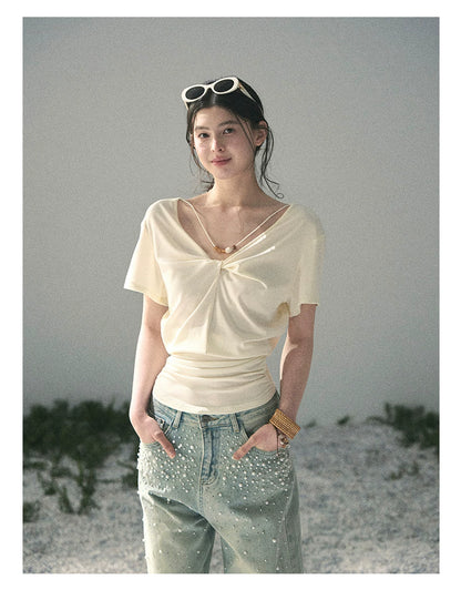 “White Between Breaths” Ivory Twist V-Neck Top