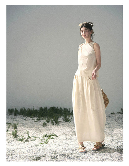 “Ivory Pleated Verse” Soft White Asymmetrical Twist Top & Skirt
