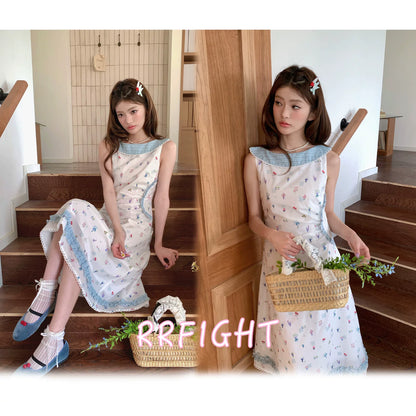 “Blue Meadow Letter” Misty Blue Floral Maxi Dress