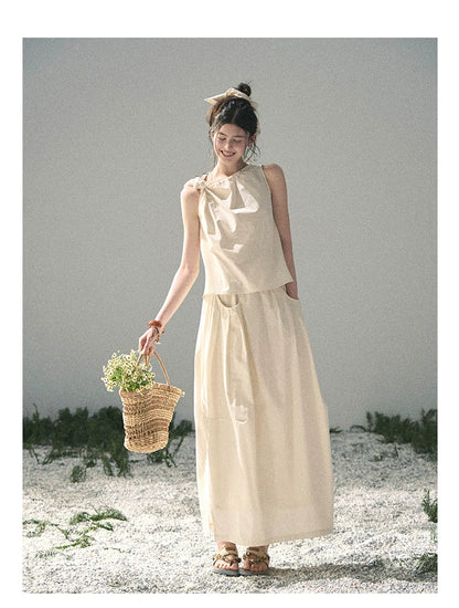 “Ivory Pleated Verse” Soft White Asymmetrical Twist Top & Skirt