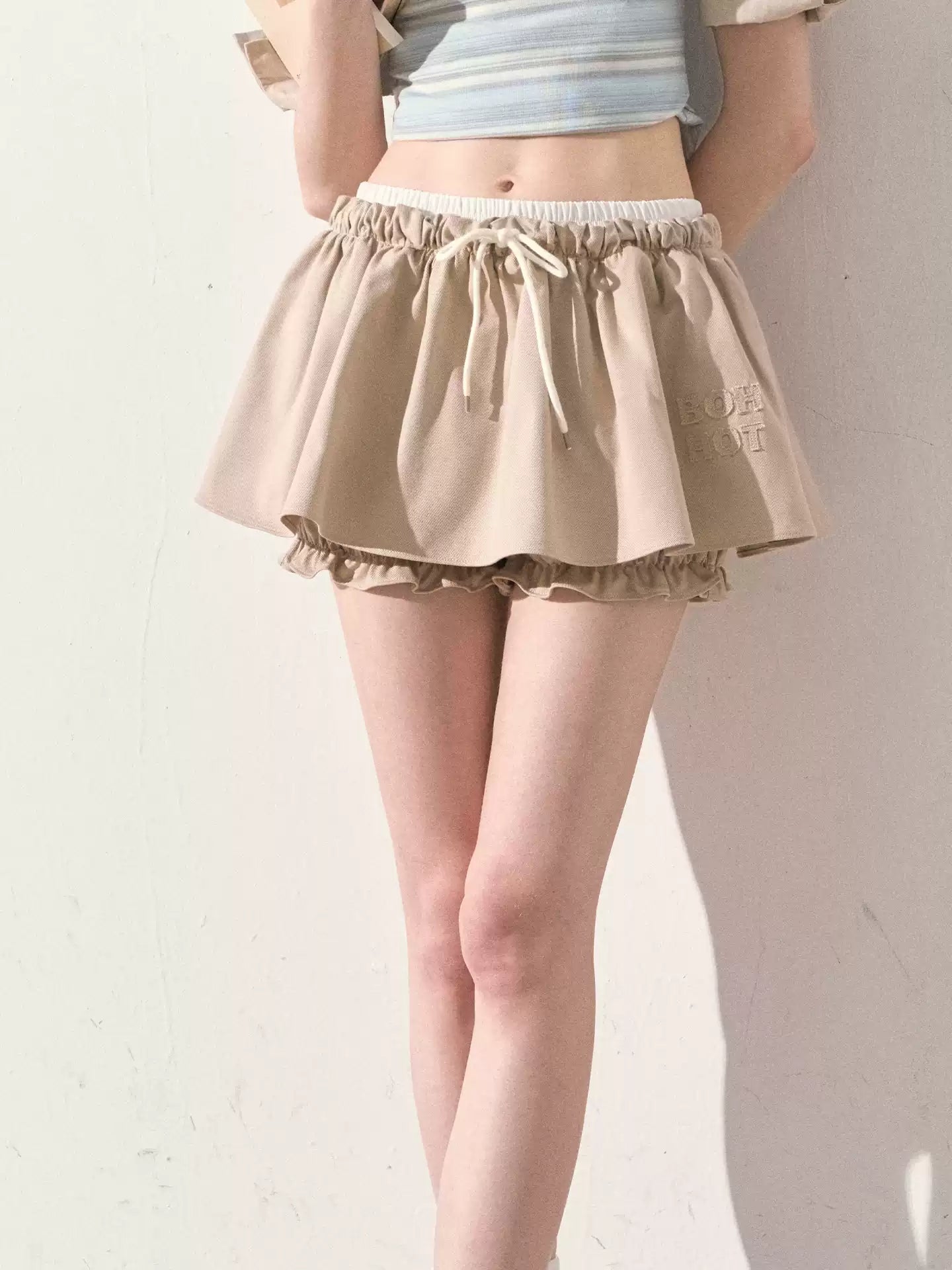 "The Space Between" Beige Drawstring Bubble Mini Skirt