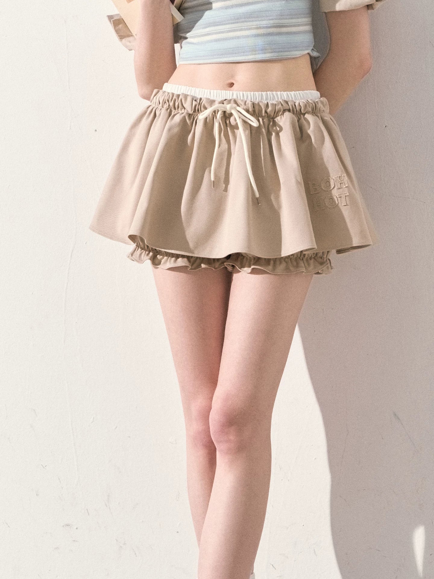 "The Space Between" Beige Drawstring Bubble Mini Skirt