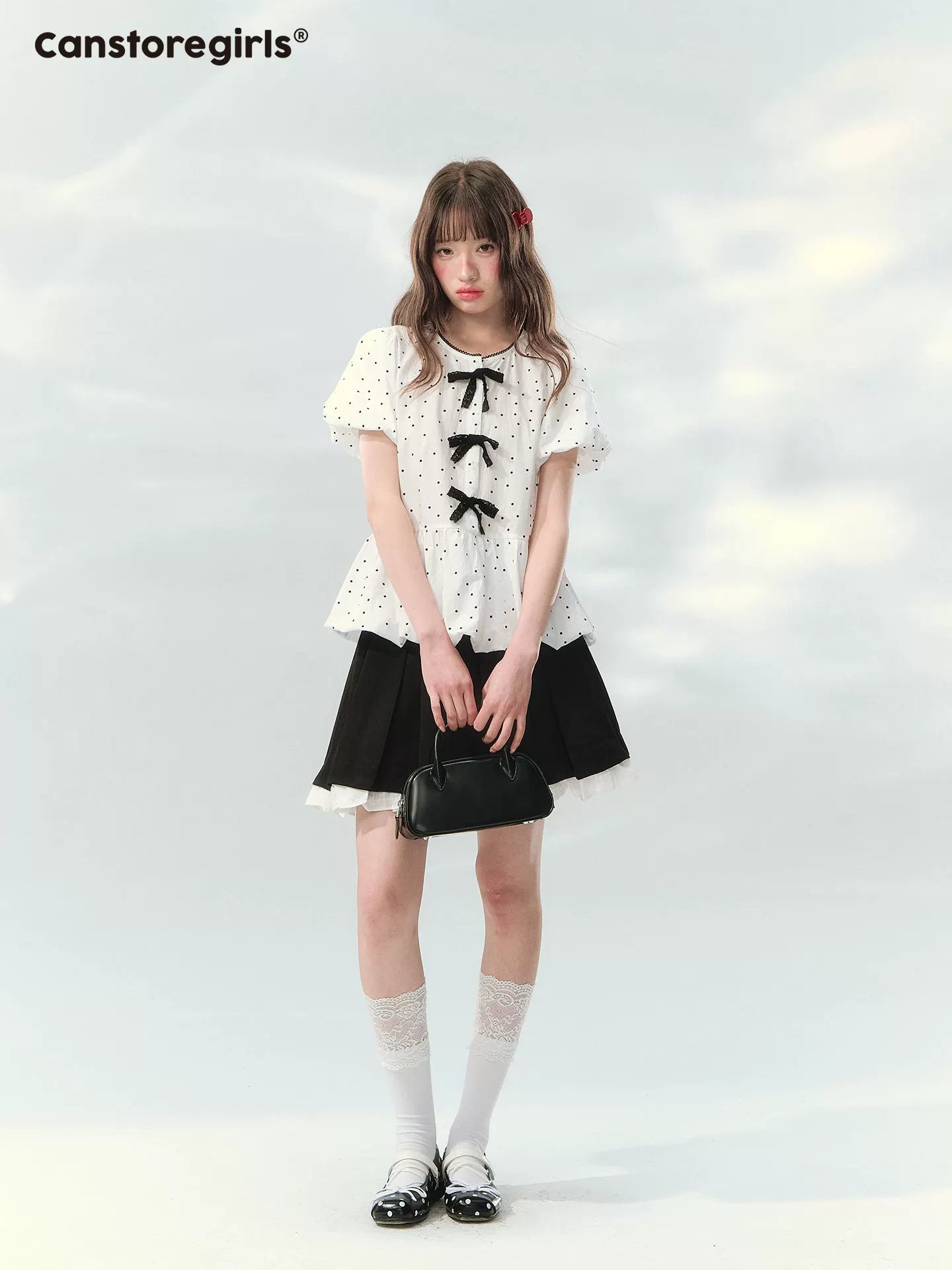 “Polka Soufflé” White Polka Dot Bow Peplum Blouse