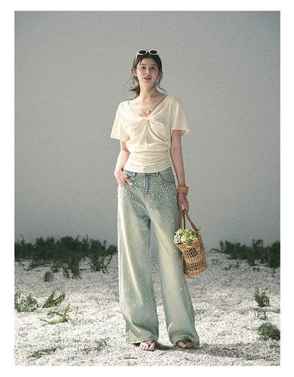 “White Between Breaths” Ivory Twist V-Neck Top