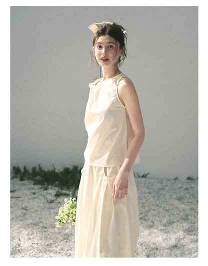 “Ivory Pleated Verse” Soft White Asymmetrical Twist Top & Skirt
