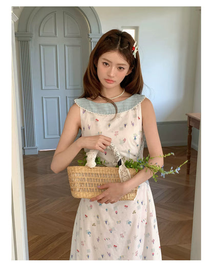 “Blue Meadow Letter” Misty Blue Floral Maxi Dress