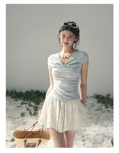 “Sheer Spring Whisper” Moonlight Blue Twist V-Neck Top