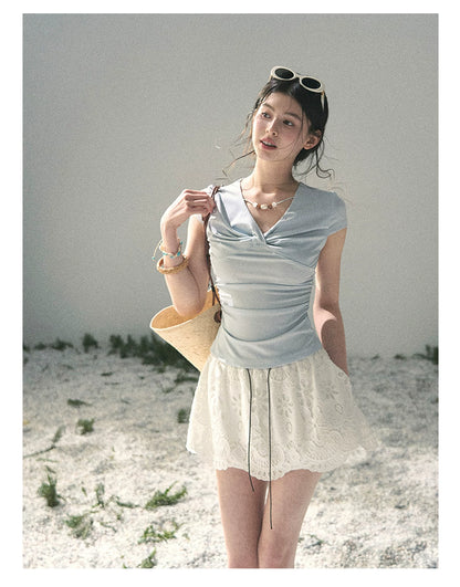“Sheer Spring Whisper” Moonlight Blue Twist V-Neck Top