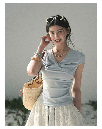 “Sheer Spring Whisper” Moonlight Blue Twist V-Neck Top