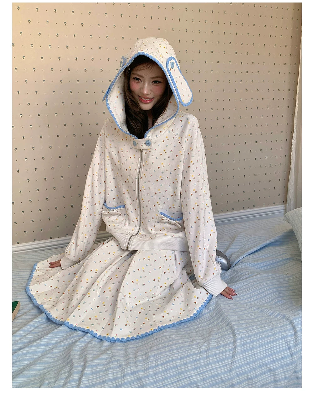 “Snow Bunny Reverie” Ivory Rabbit Ear Hoodie & Floral Pleated Mini Skirt