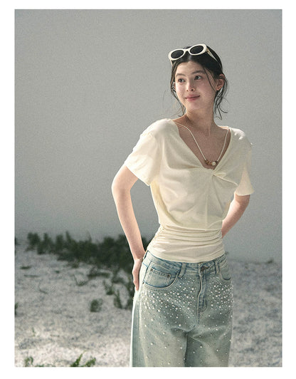 “White Between Breaths” Ivory Twist V-Neck Top