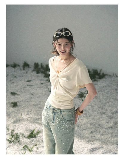 “White Between Breaths” Ivory Twist V-Neck Top