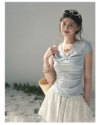 “Sheer Spring Whisper” Moonlight Blue Twist V-Neck Top