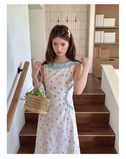 “Blue Meadow Letter” Misty Blue Floral Maxi Dress