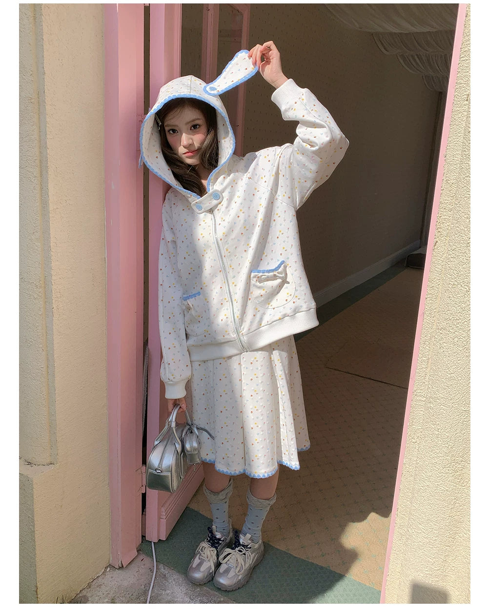 “Snow Bunny Reverie” Ivory Rabbit Ear Hoodie & Floral Pleated Mini Skirt