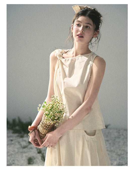 “Ivory Pleated Verse” Soft White Asymmetrical Twist Top & Skirt