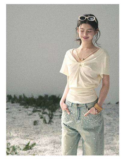 “White Between Breaths” Ivory Twist V-Neck Top
