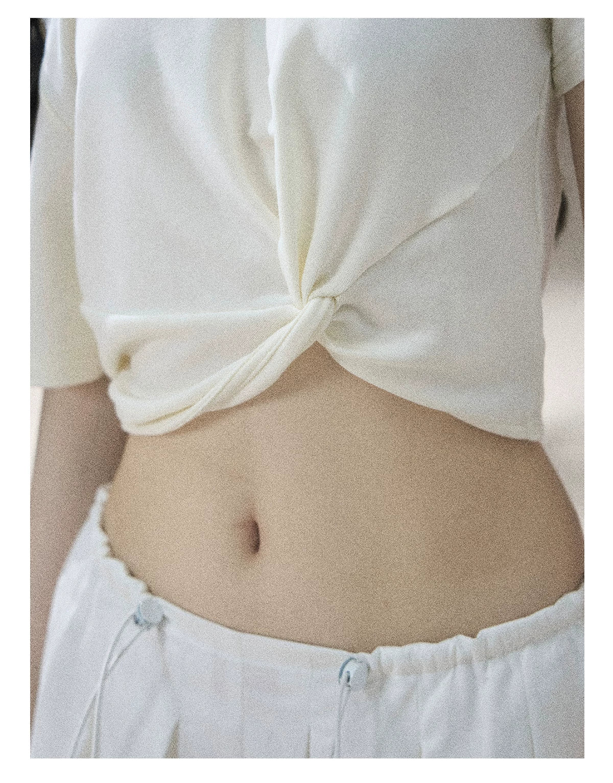 "Moonlight Upon Her" Creamy Apricot Off-Shoulder Twist Cropped T-Shirt