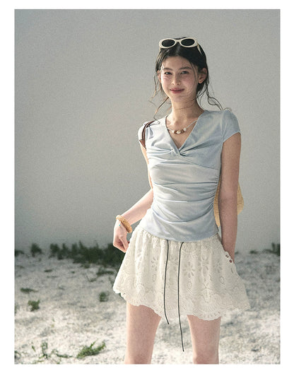 “Sheer Spring Whisper” Moonlight Blue Twist V-Neck Top