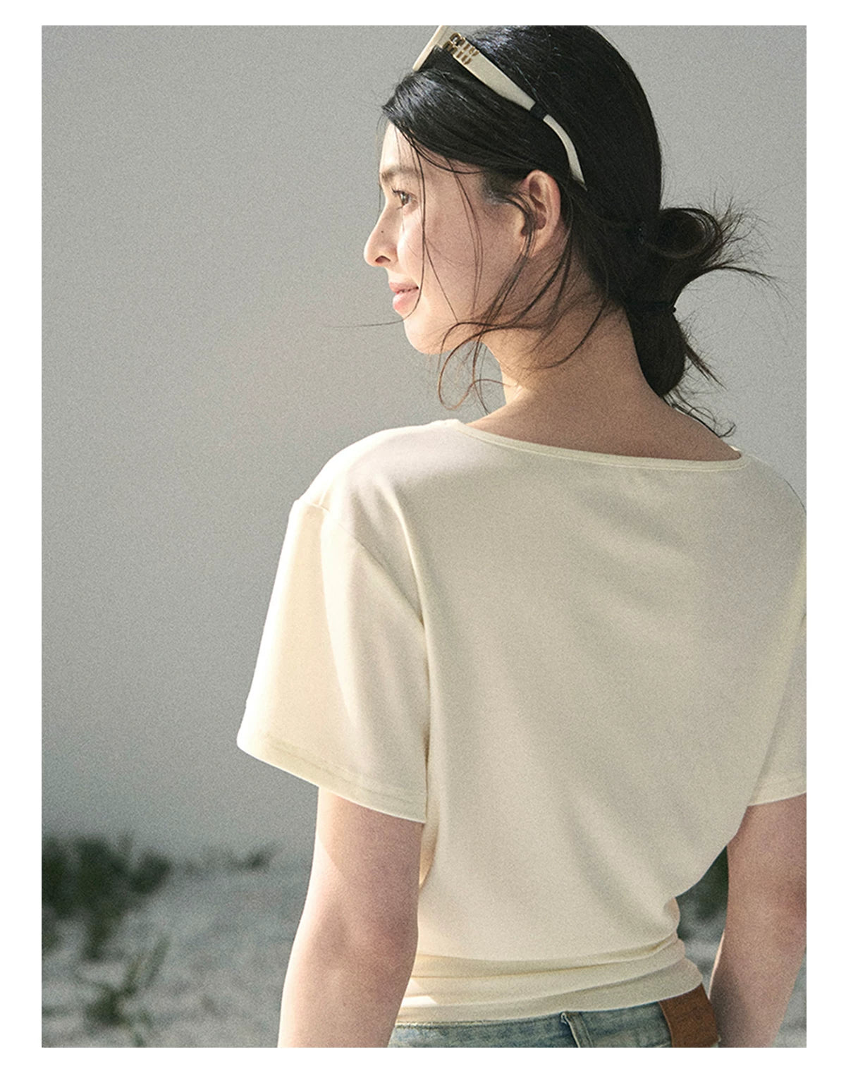 “White Between Breaths” Ivory Twist V-Neck Top