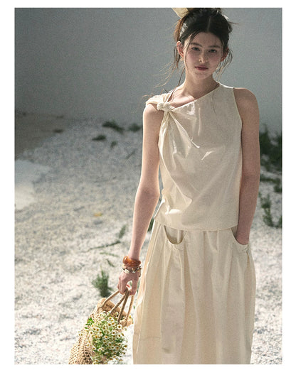 “Ivory Pleated Verse” Soft White Asymmetrical Twist Top & Skirt