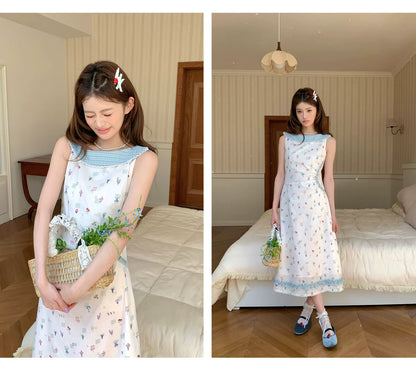 “Blue Meadow Letter” Misty Blue Floral Maxi Dress