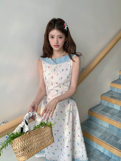 “Blue Meadow Letter” Misty Blue Floral Maxi Dress