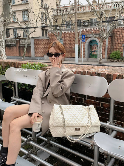 "First Class Arrival" Black Quilted Chain Tote Bag