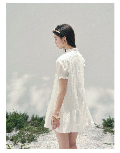 “Soft Pleats in Motion” Camellia White Bubble Mini Dress