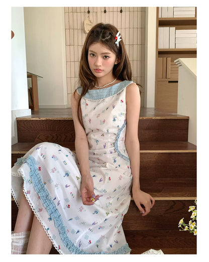 “Blue Meadow Letter” Misty Blue Floral Maxi Dress
