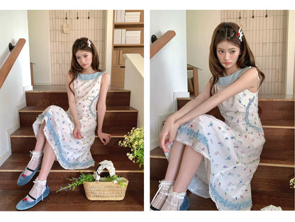 “Blue Meadow Letter” Misty Blue Floral Maxi Dress