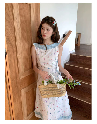 “Blue Meadow Letter” Misty Blue Floral Maxi Dress