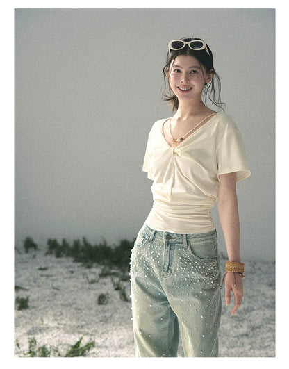 “White Between Breaths” Ivory Twist V-Neck Top