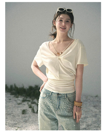 “White Between Breaths” Ivory Twist V-Neck Top