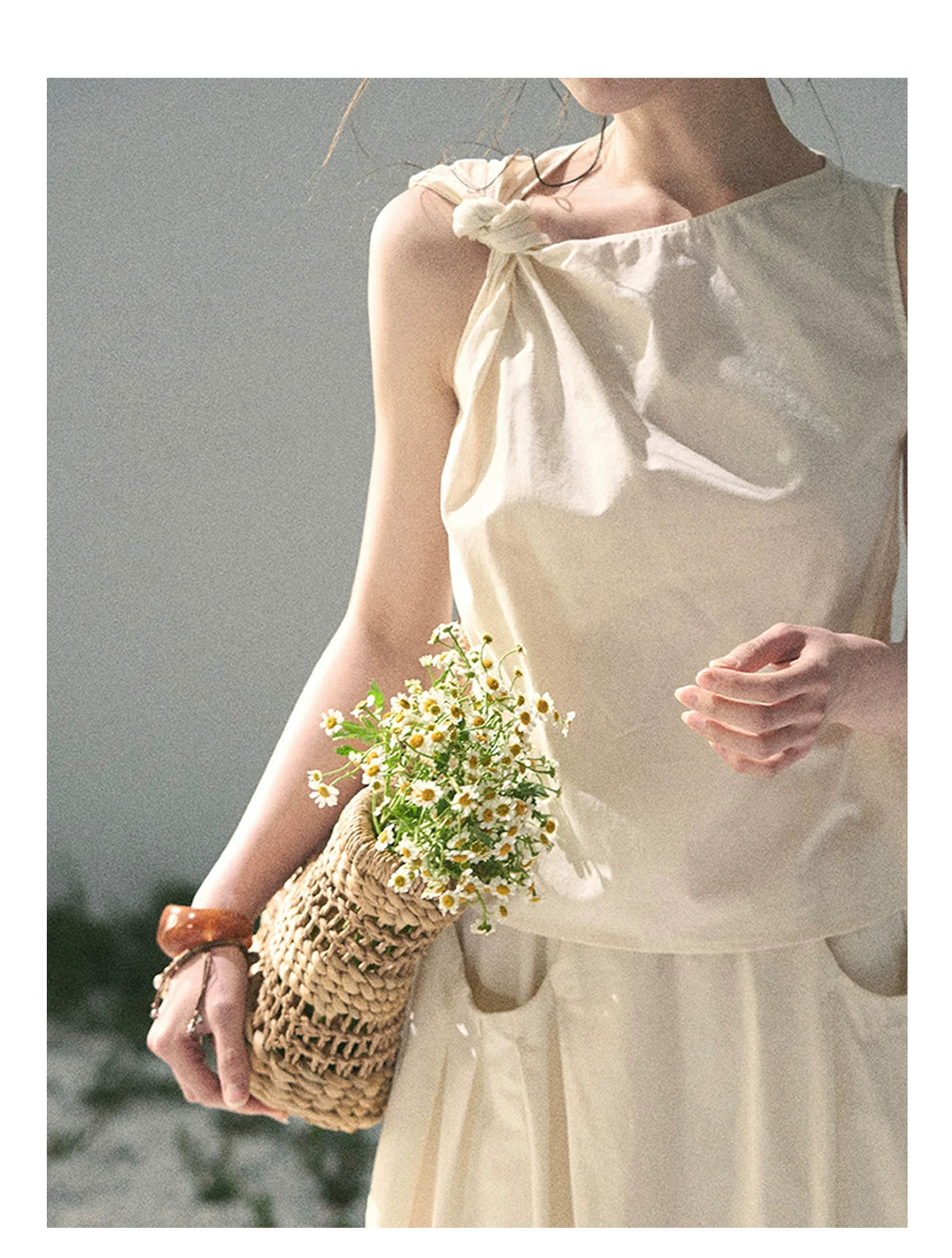 “Ivory Pleated Verse” Soft White Asymmetrical Twist Top & Skirt
