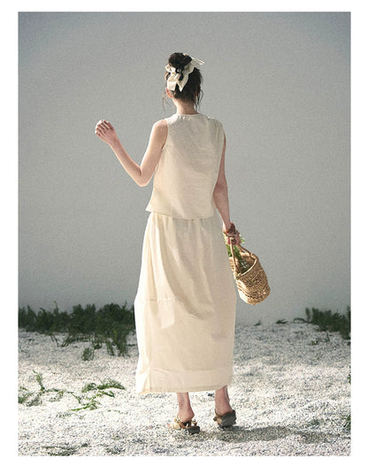 “Ivory Pleated Verse” Soft White Asymmetrical Twist Top & Skirt