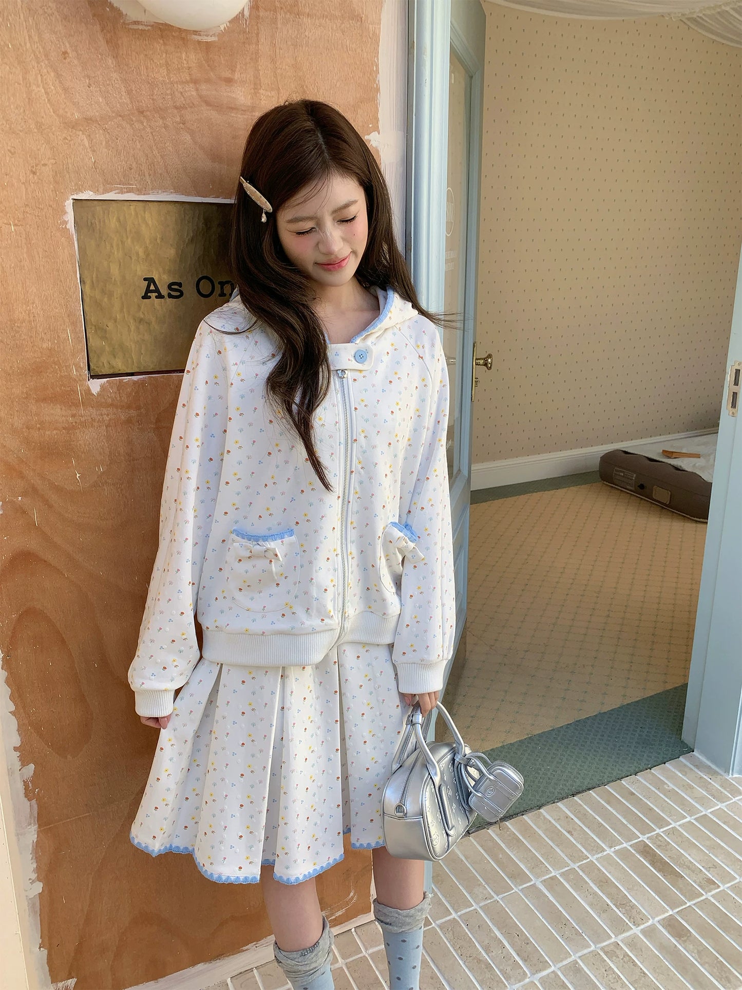 “Snow Bunny Reverie” Ivory Rabbit Ear Hoodie & Floral Pleated Mini Skirt