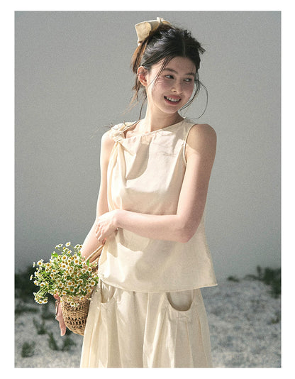 “Ivory Pleated Verse” Soft White Asymmetrical Twist Top & Skirt
